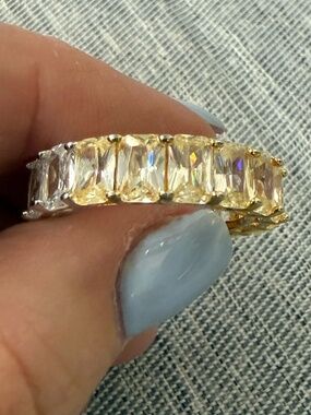 Freida Rothman sterling silver band with two tone large baguette stones, size 8